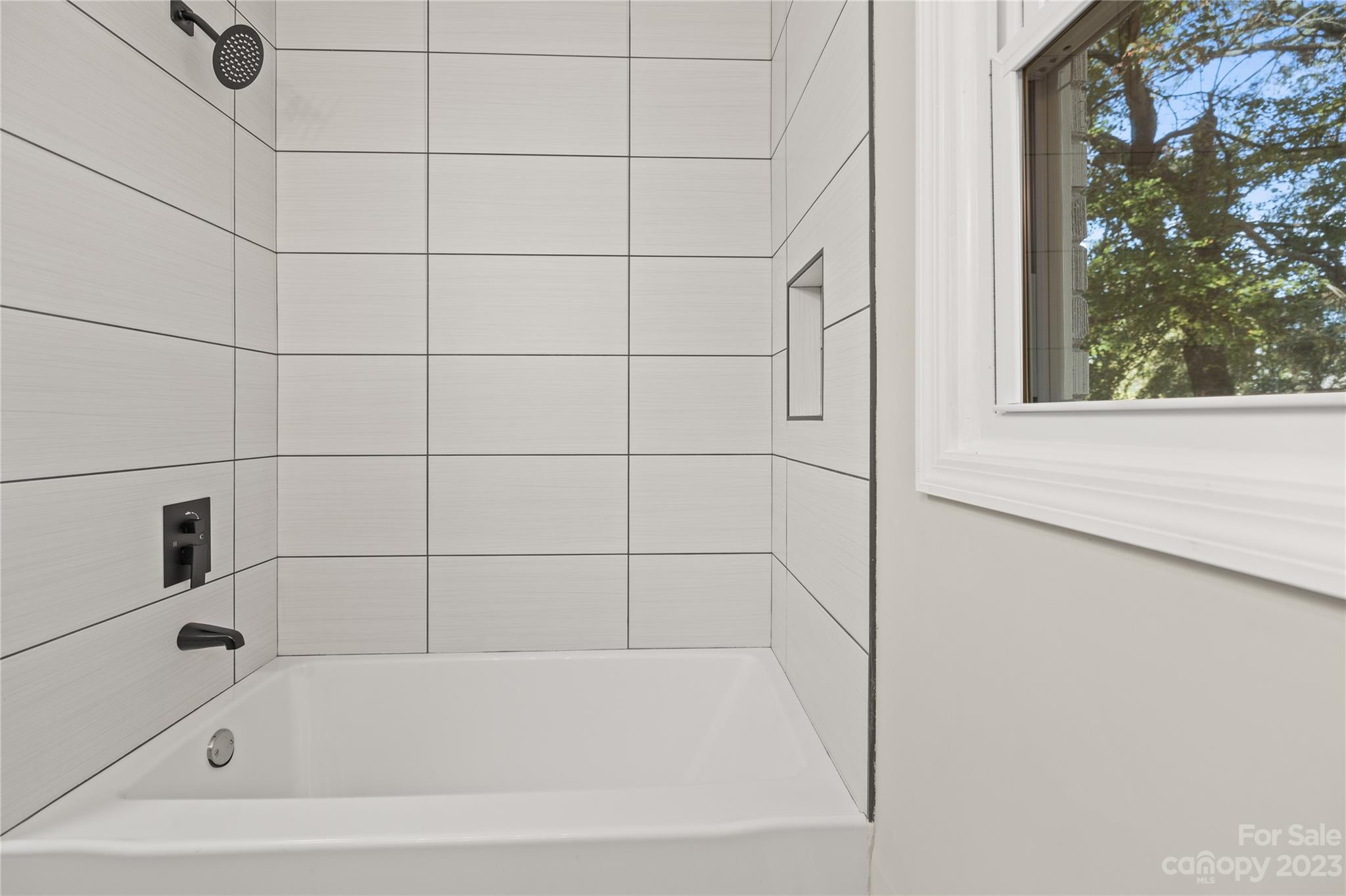 1415 East Main Street Cherryville, NC 28021 - Photo 12 of 34 a bathroom with a bathtub
