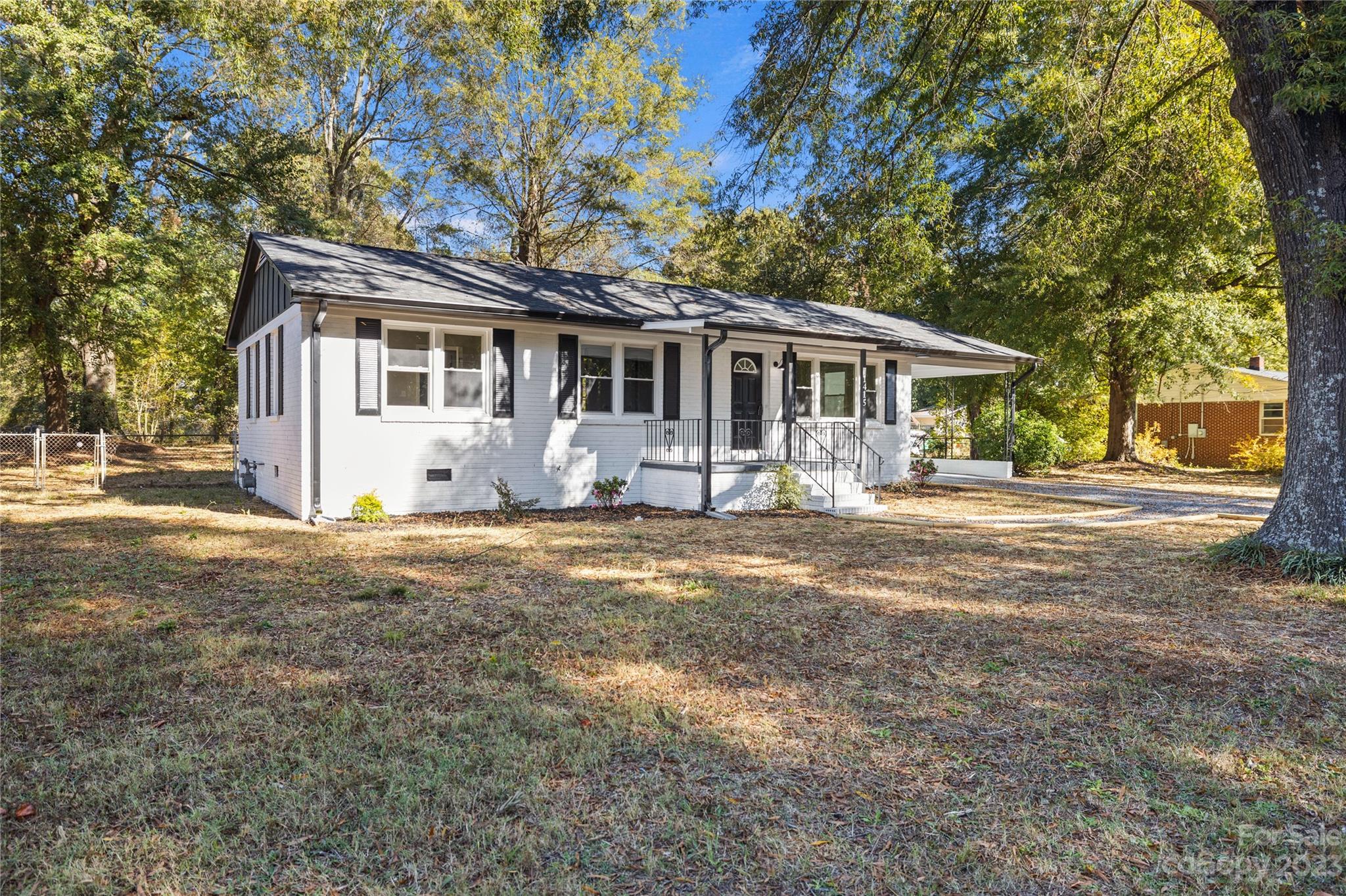 1415 East Main Street Cherryville, NC 28021 - Photo 25 of 34 a front view of house with yard