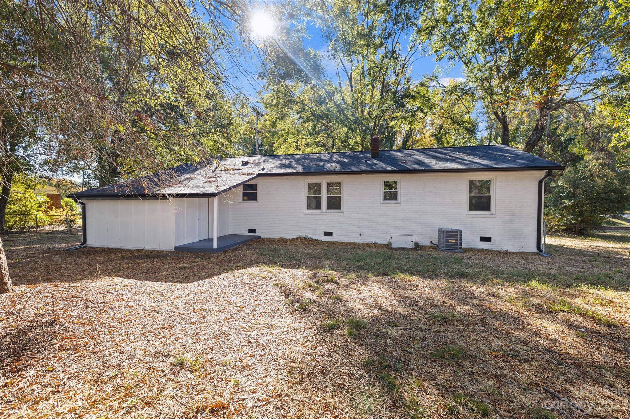 1415 East Main Street Cherryville, NC 28021 - Photo 27 of 34 a view of a house with a yard
