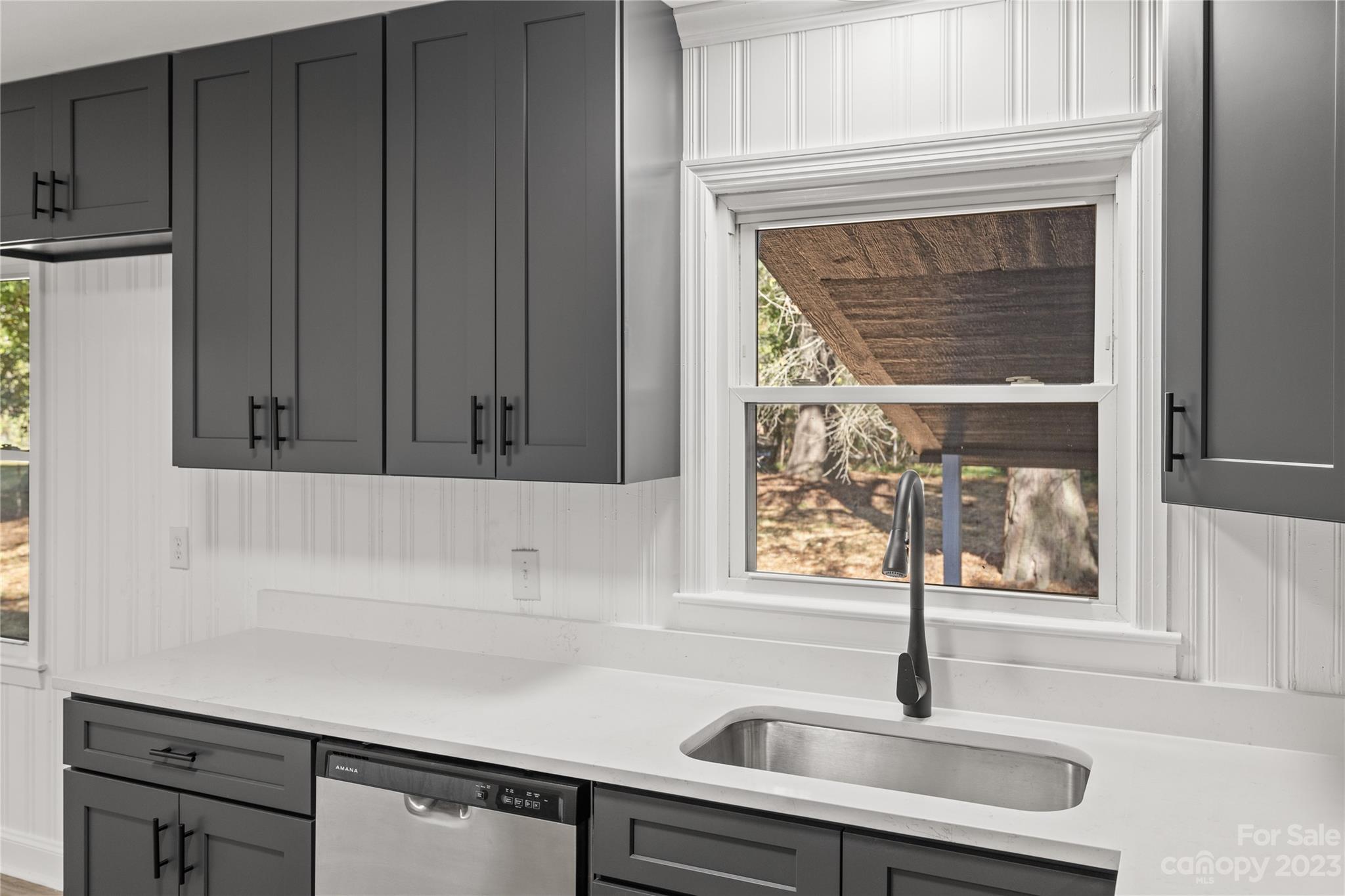 1415 East Main Street Cherryville, NC 28021 - Photo 3 of 34 a kitchen with a sink and cabinets