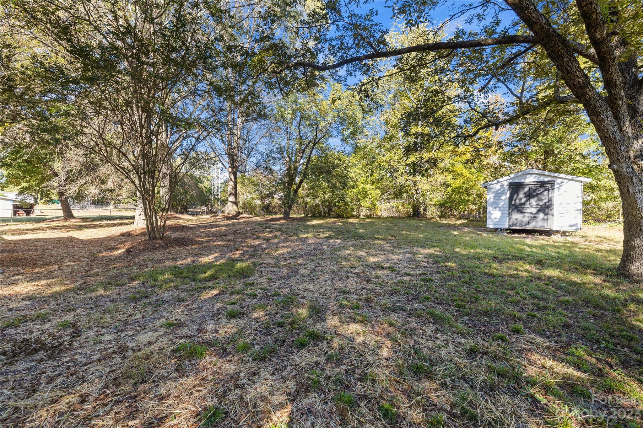 1415 East Main Street Cherryville, NC 28021 - Photo 31 of 34 a view of outdoor space with trees all around
