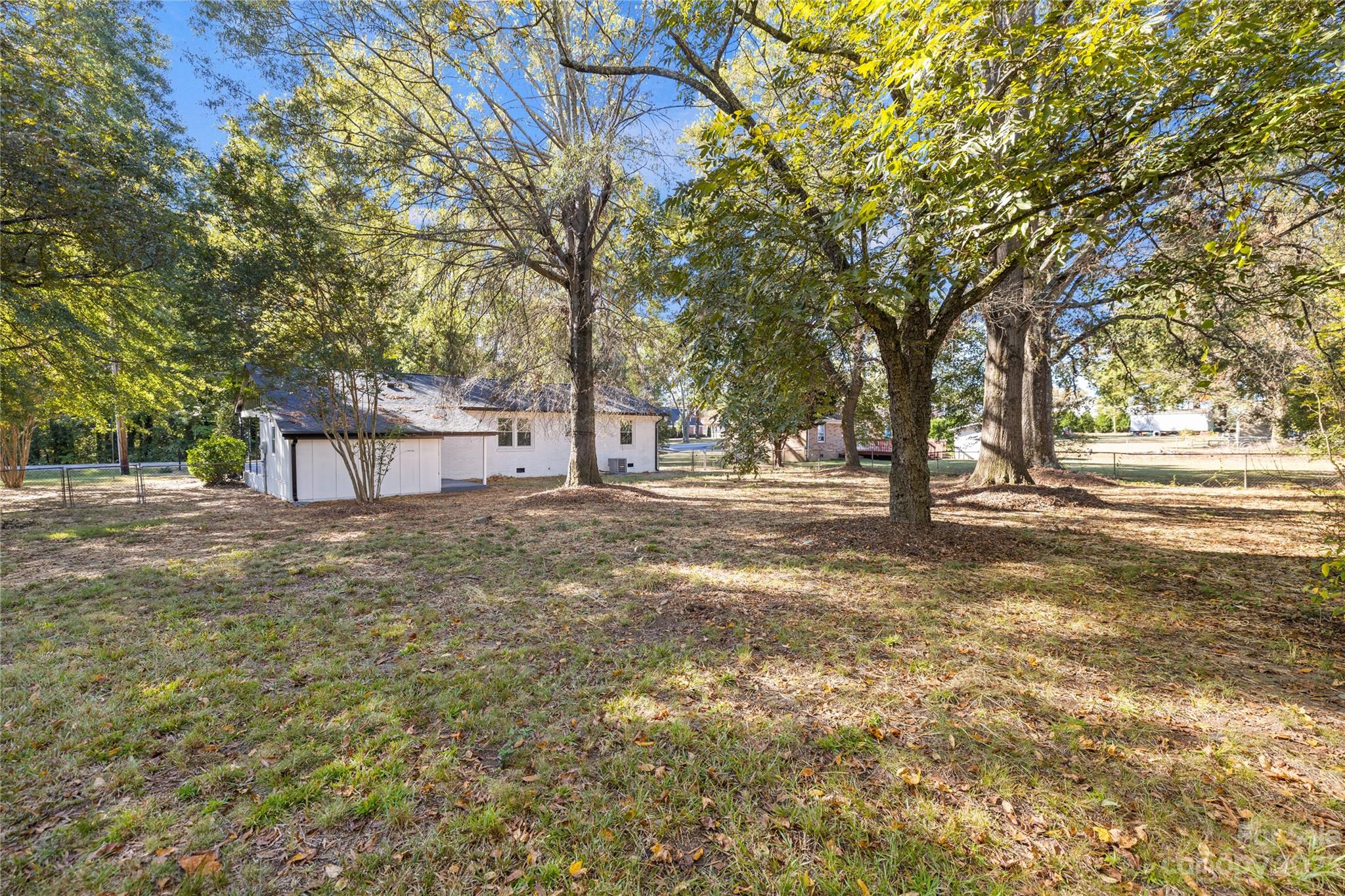 1415 East Main Street Cherryville, NC 28021 - Photo 32 of 34 a view of a yard with a tree