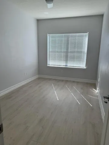 a view of a hallway to the house