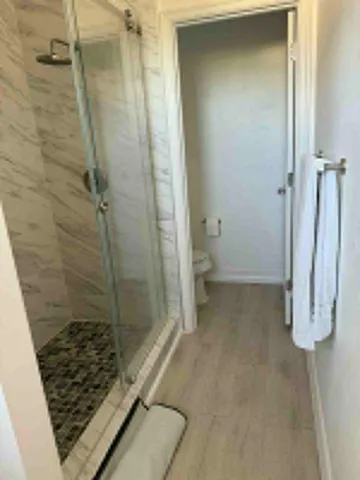 a utility room with sink dryer and washer