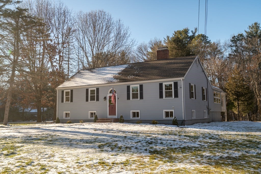 3 Silverbrook Road Boxford, MA 01921 - Photo 1 of 39 a view of a house with a wooden fence next to a yard