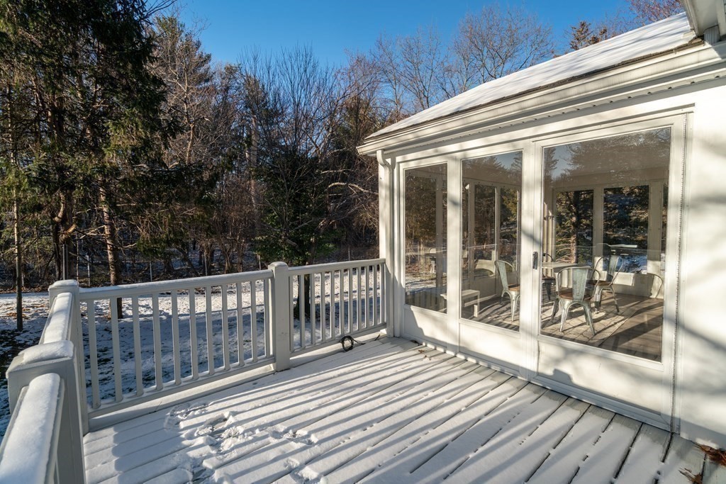 3 Silverbrook Road Boxford, MA 01921 - Photo 36 of 39 a view of a wooden deck with a yard