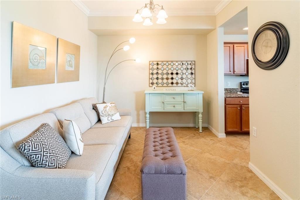 9731 Acqua Court, Unit 536 Naples, FL 34113 - Photo 9 of 47 a living room with furniture