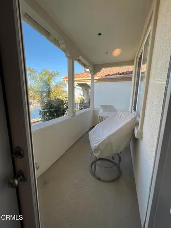a room with furniture and a window
