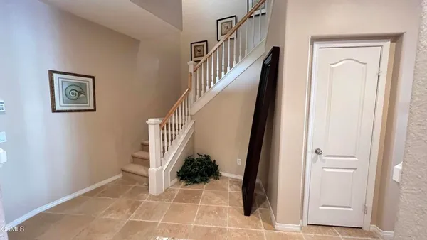 a view of a hallway with front door