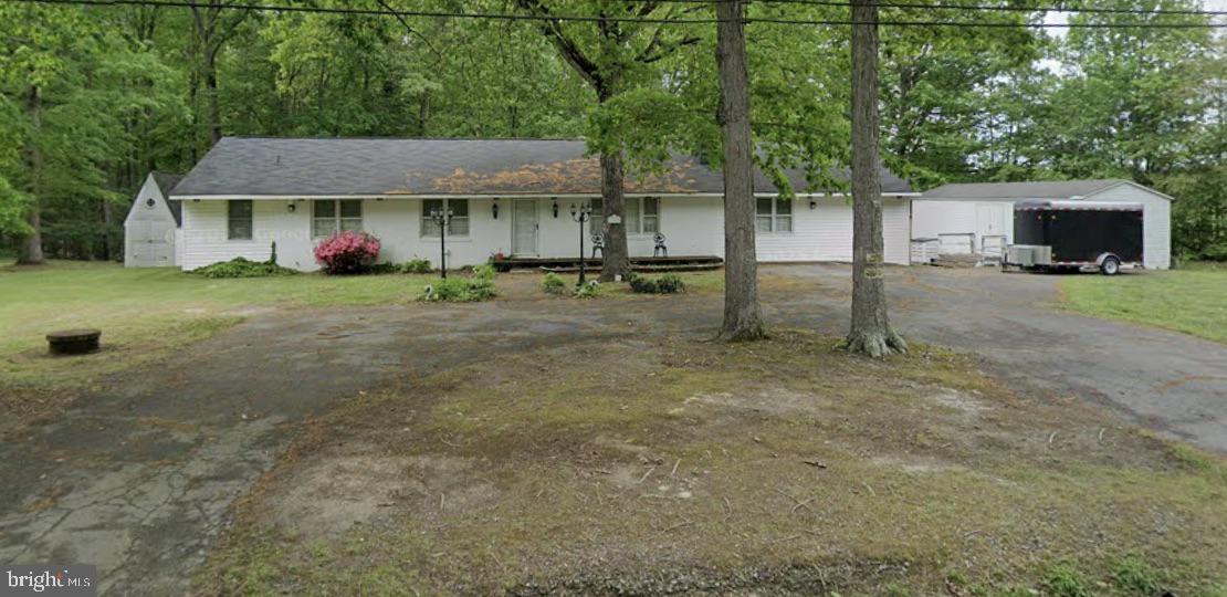 11520 Catharpin Road Spotsylvania, VA 22553 - Photo 1 of 1 a view of a house with a yard and tree