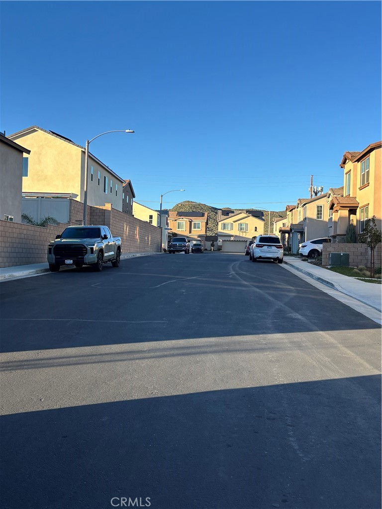 a view of a car parked in front of a house