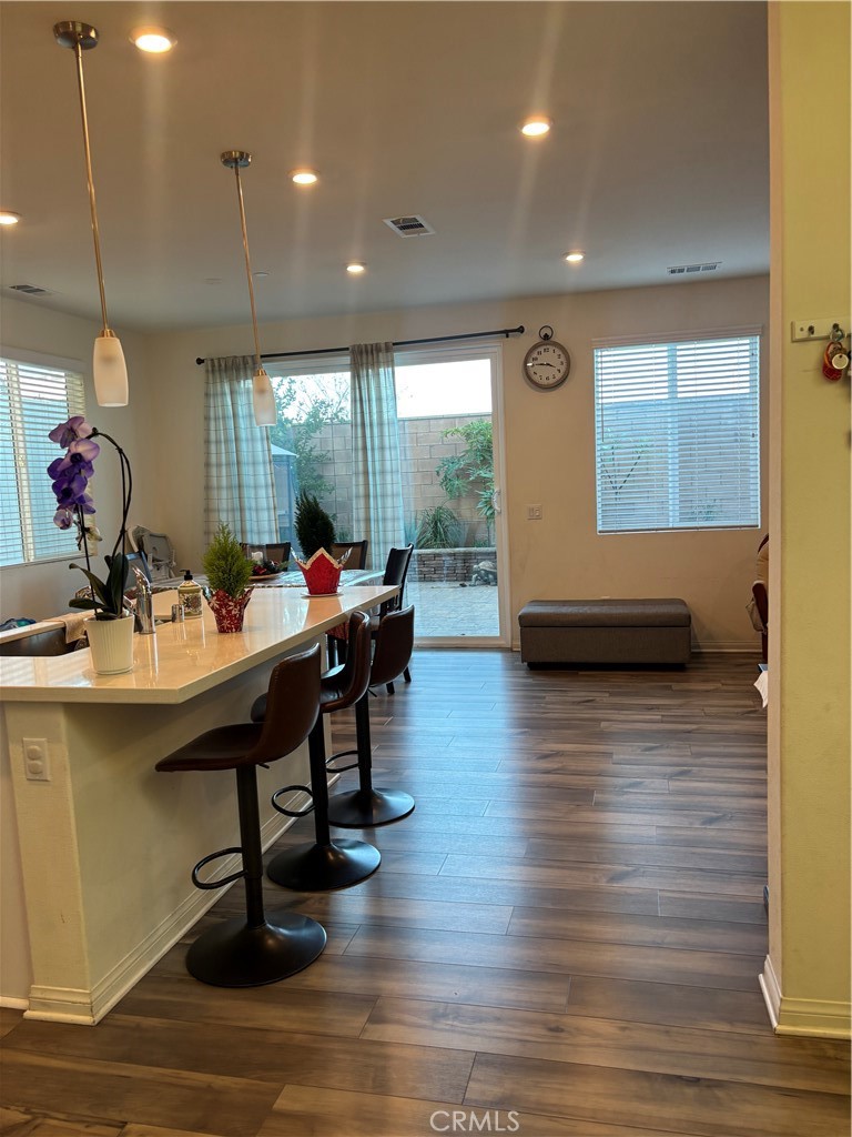 533 Pablo Road Lake Elsinore, CA 92530 - Photo 6 of 21 a view of a dining room with furniture window and wooden floor