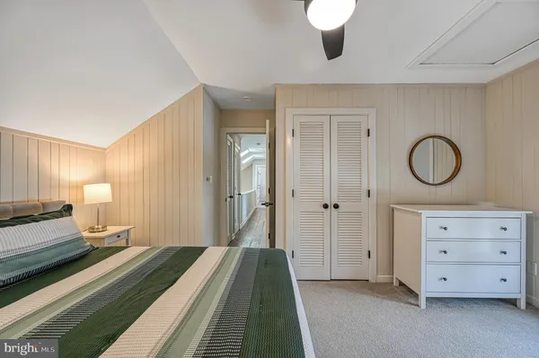 a view of a hallway with a wooden floor