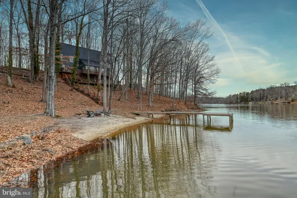 a view of a lake with a house