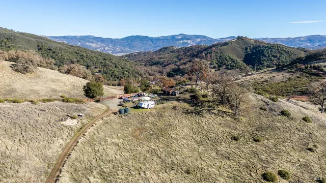 a view of a house with a mountain