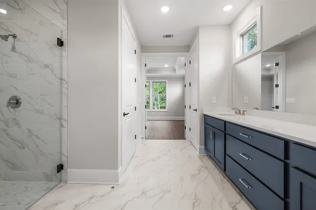 a bathroom with a sink a toilet and a bathtub
