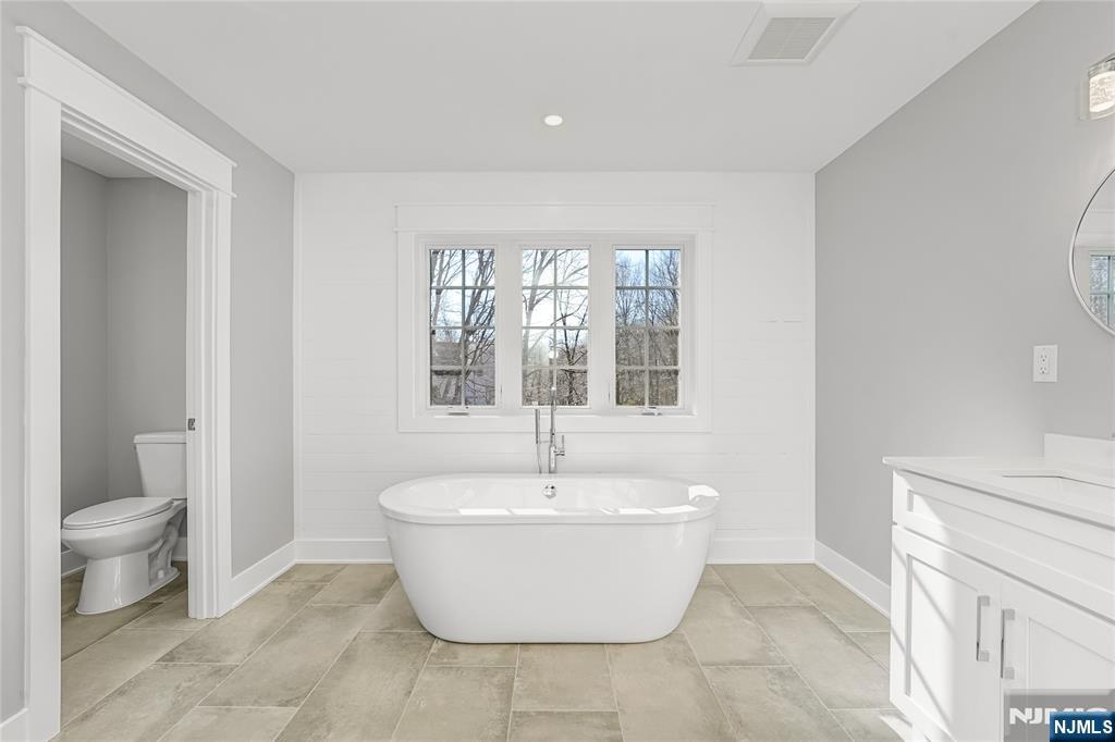 1 Lourdes Court Andover, NJ 07821 - Photo 20 of 40 a white room with a toilet