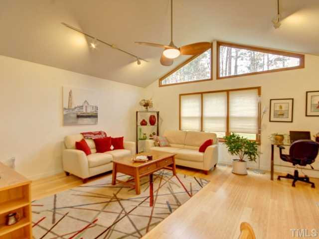 8804 Broadmore Court Raleigh, NC 27613 - Photo 13 of 23 What a wonderful addition to the home! This bright and spacious family room was added on in 2005 and features a vaulted ceiling, remote control ceiling fan, and track lighting. Open to Kitchen & access to screen porch! Den/Family/Great Room