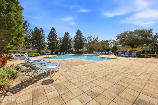a view of a house with swimming pool