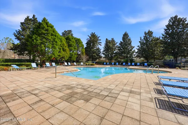 a view of a house with swimming pool