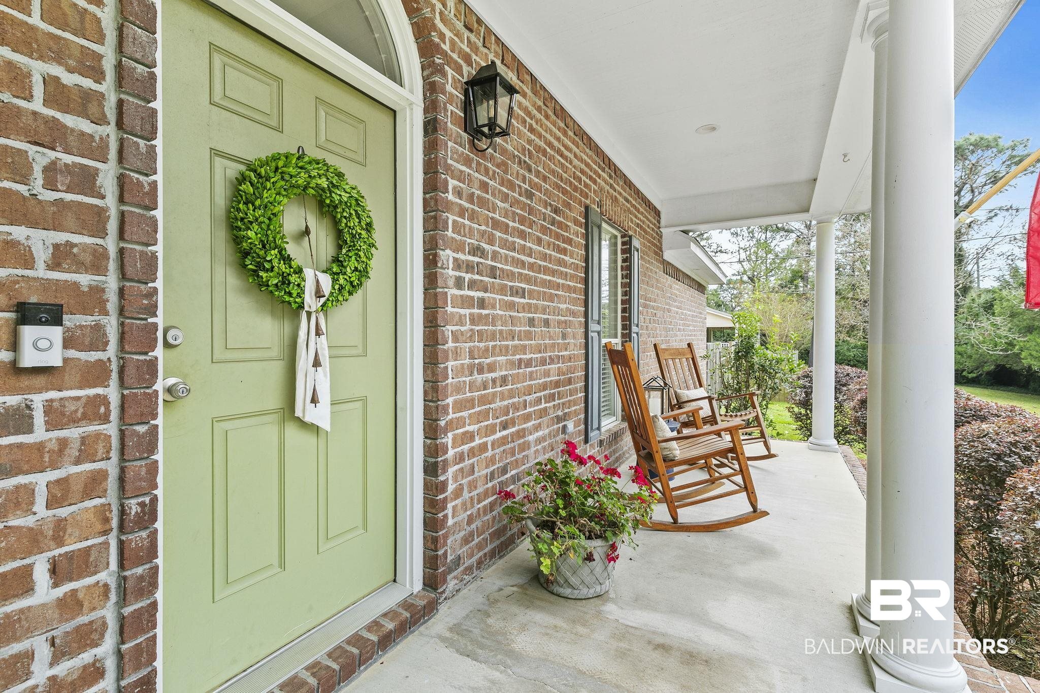 32072 Buzbee Road Daphne, AL 36527 - Photo 7 of 41 Doorway to property featuring covered porch