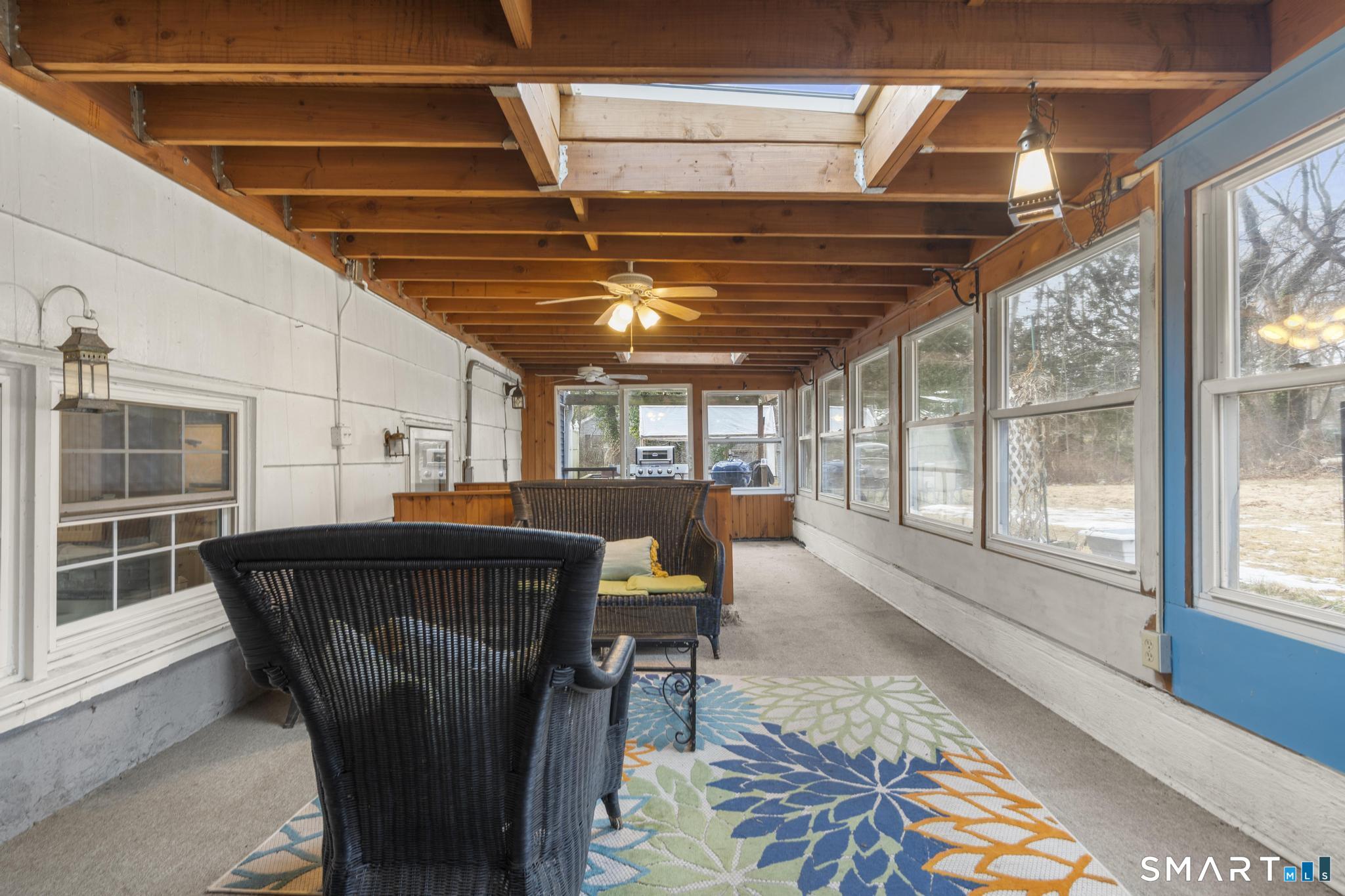 89 Green Meadow Road Milford, CT 06461 - Photo 26 of 31 a view of a chairs and table in the patio