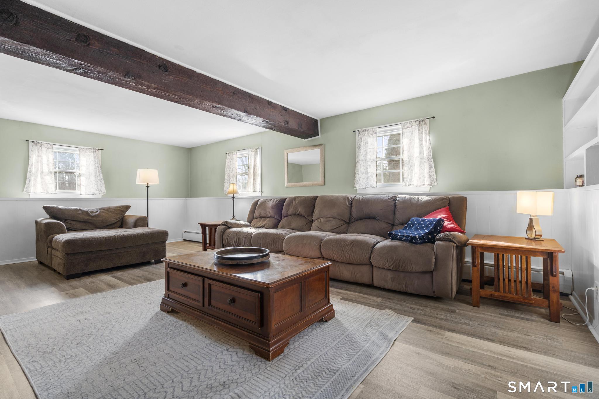 89 Green Meadow Road Milford, CT 06461 - Photo 5 of 31 a living room with furniture and a window