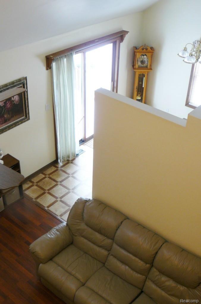 7180 McGuire Road Fenton, MI 48430 - Photo 29 of 50 Partial view of Living room and Dining room from 2nd floor landing