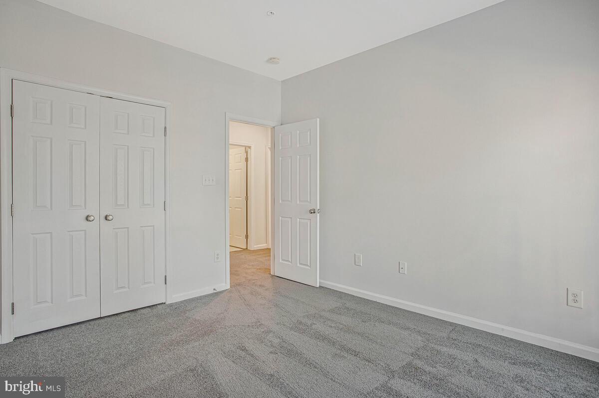 8049 Forest Ridge Drive, Unit 3 Chesapeake Beach, MD 20732 - Photo 19 of 40 a view of an empty room