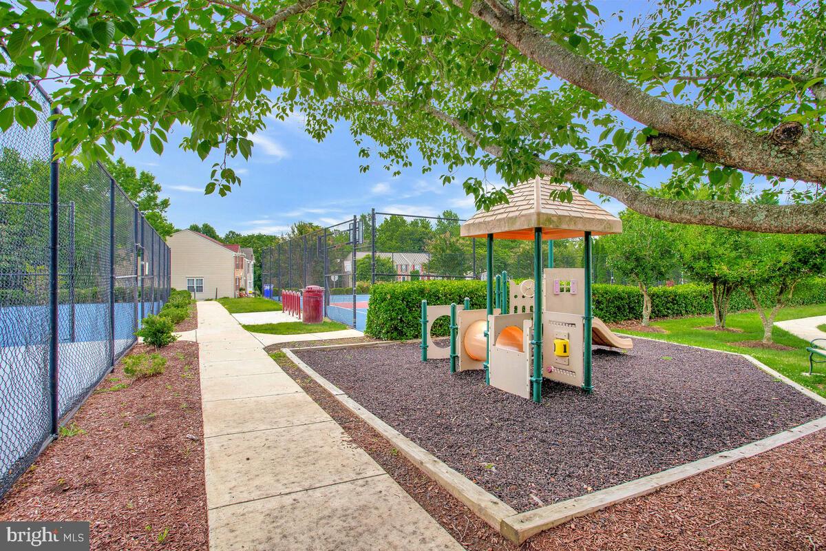 8049 Forest Ridge Drive, Unit 3 Chesapeake Beach, MD 20732 - Photo 32 of 40 a view of a park with slide