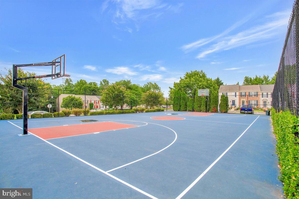 8049 Forest Ridge Drive, Unit 3 Chesapeake Beach, MD 20732 - Photo 33 of 40 a view of a tennis court