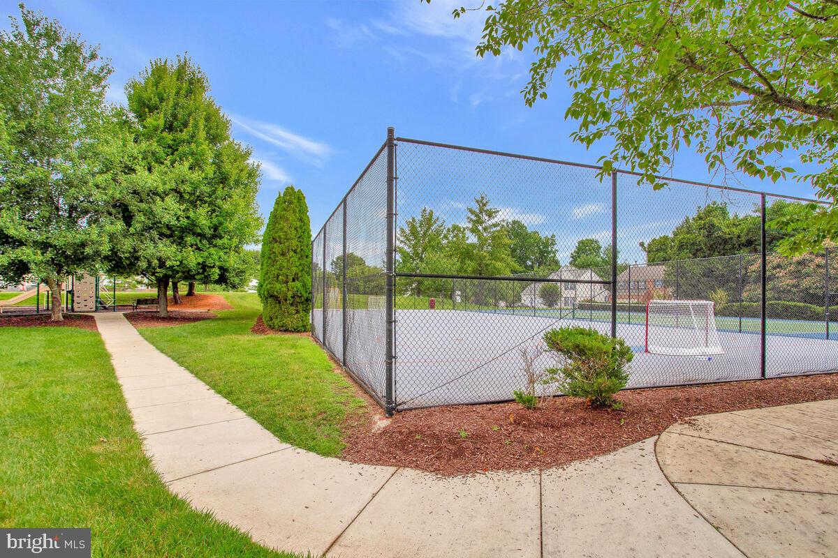 8049 Forest Ridge Drive, Unit 3 Chesapeake Beach, MD 20732 - Photo 36 of 40 a garden view with a seating space
