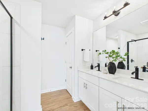 a bathroom with a bath tub and a shower