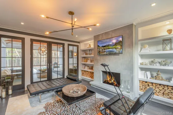 a living room with furniture and a table
