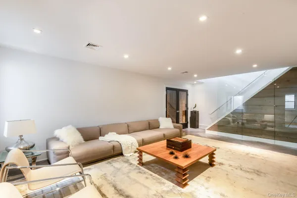 a living room with furniture and a table