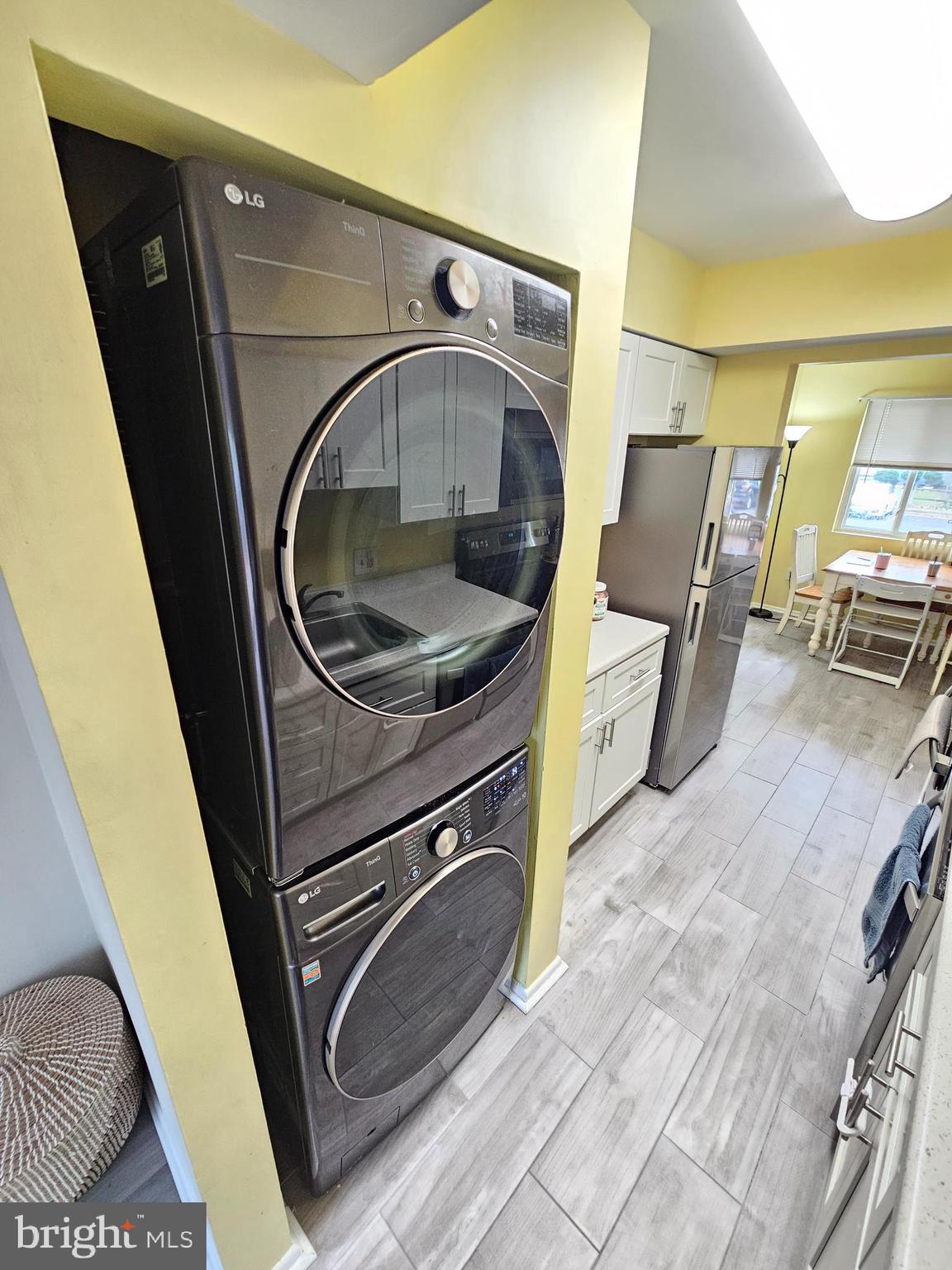 17445 Hoskinson Road Poolesville, MD 20837 - Photo 12 of 36 a utility room with dryer and washer