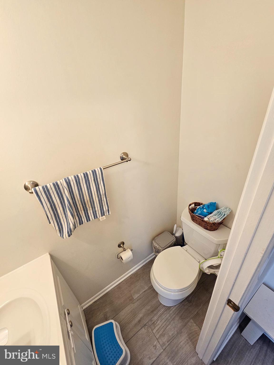 17445 Hoskinson Road Poolesville, MD 20837 - Photo 5 of 36 a bathroom with a toilet and a mirror