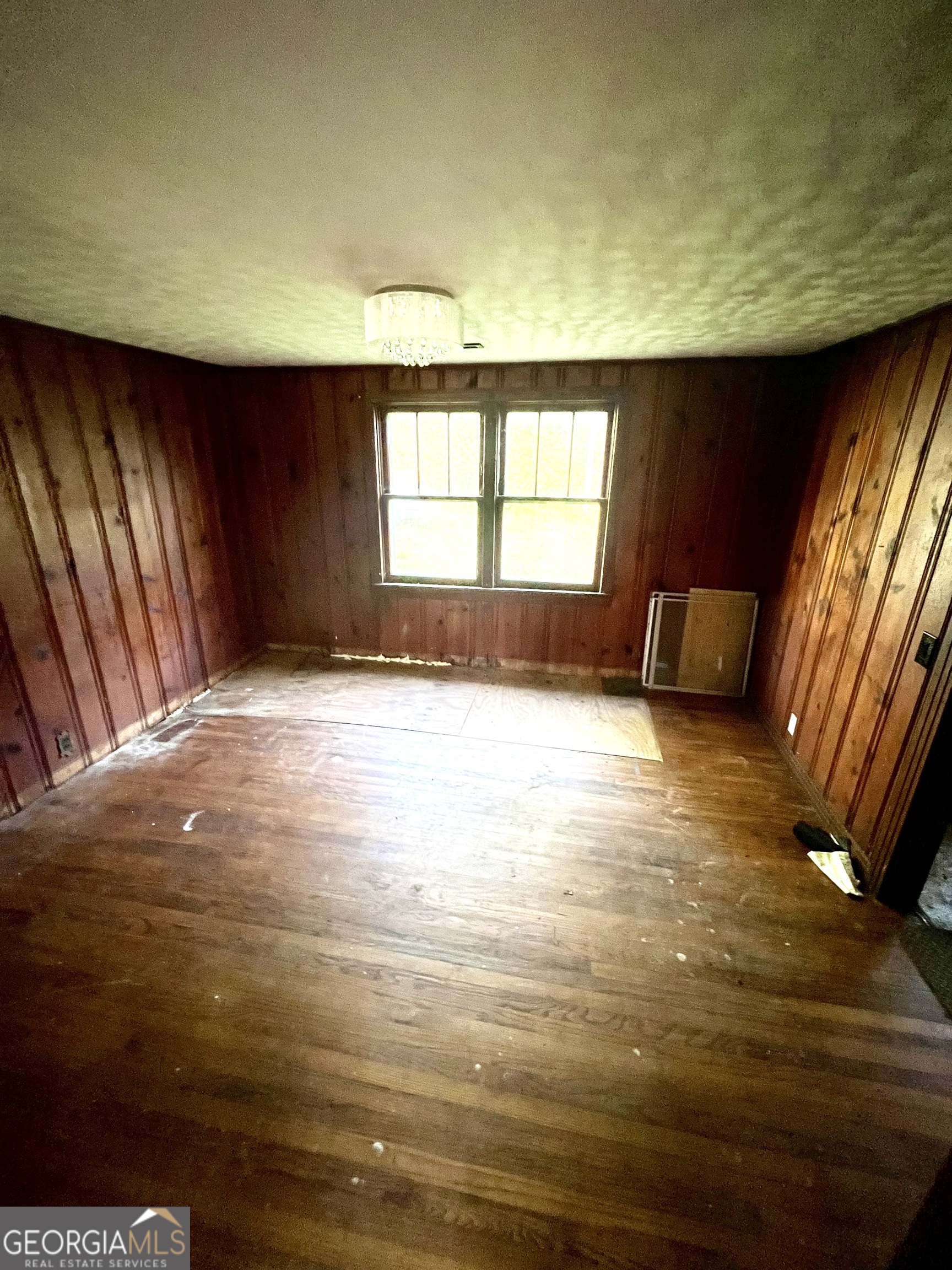 3658 West Point Road LaGrange, GA 30240 - Photo 3 of 7 a view of an empty room with a window