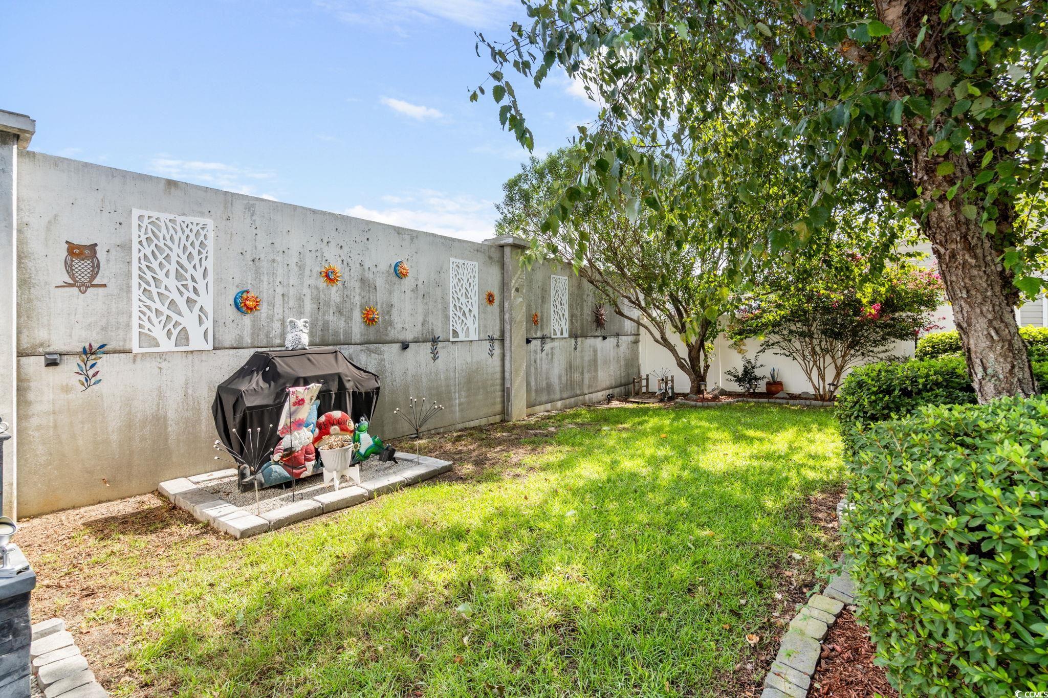 9533 Sullivan Drive Murrells Inlet, SC 29576 - Photo 25 of 40 View of fenced backyard