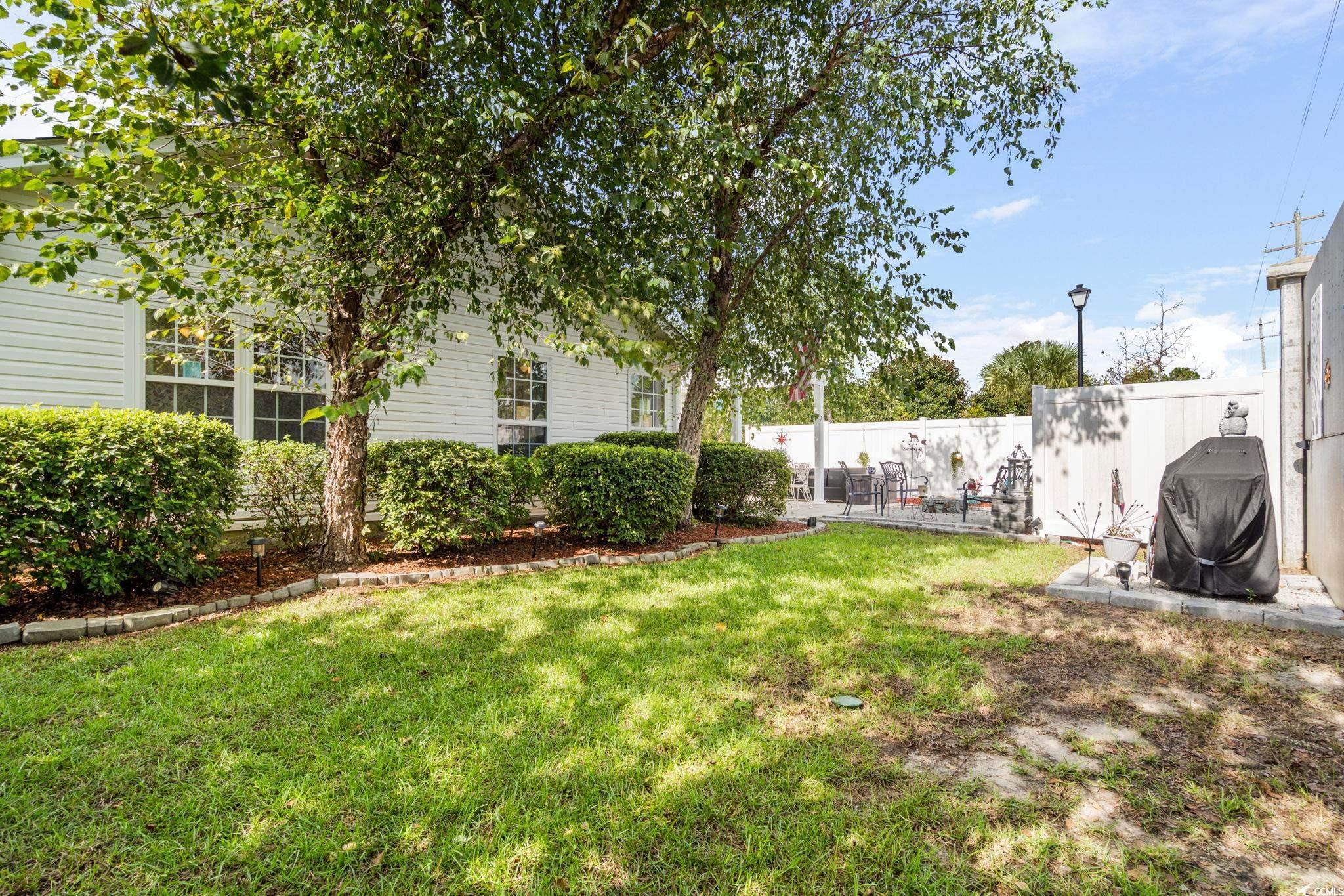 9533 Sullivan Drive Murrells Inlet, SC 29576 - Photo 26 of 40 View of yard