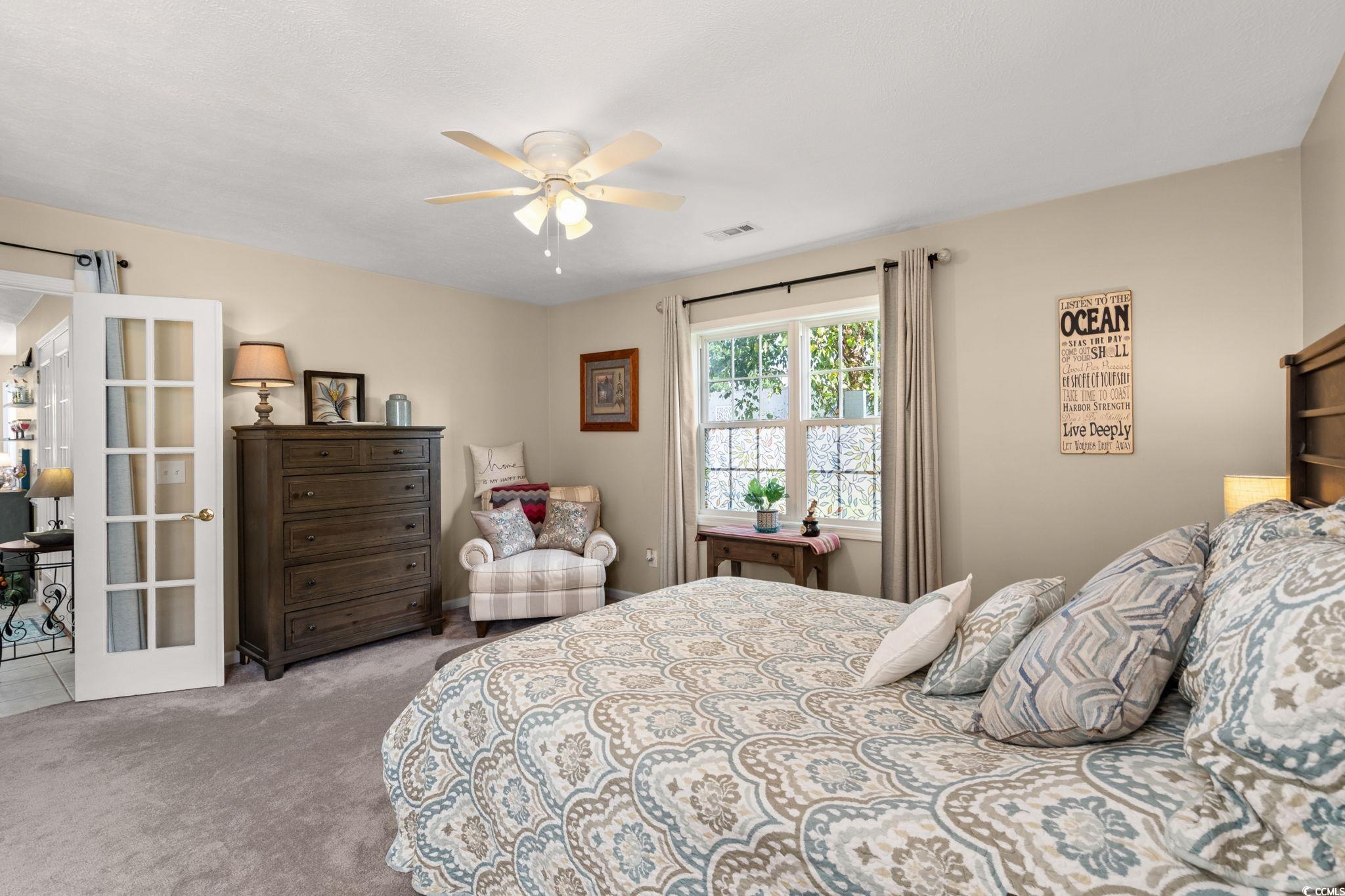 9533 Sullivan Drive Murrells Inlet, SC 29576 - Photo 29 of 40 Carpeted bedroom featuring a ceiling fan