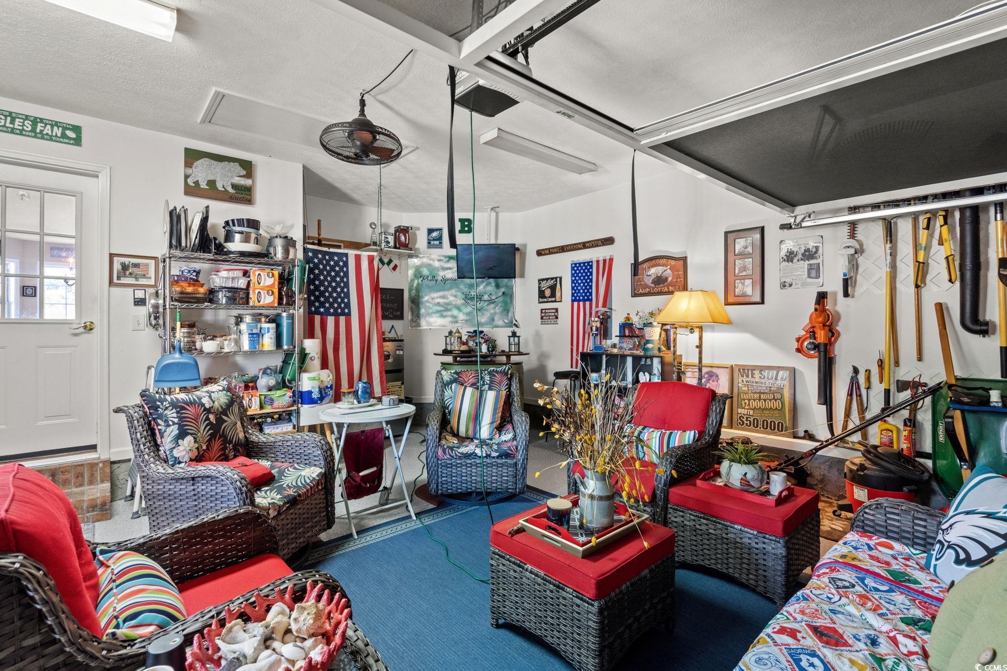 9533 Sullivan Drive Murrells Inlet, SC 29576 - Photo 37 of 40 Living area with wood finished floors