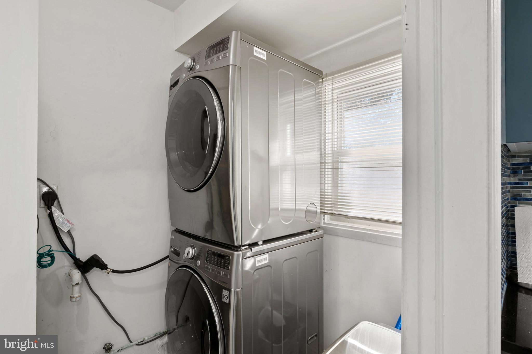 4235 Old Milford Mill Road Baltimore, MD 21208 - Photo 12 of 29 a utility room with dryer and washer