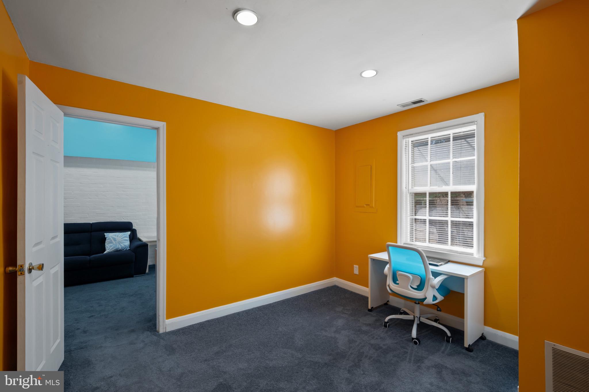 4235 Old Milford Mill Road Baltimore, MD 21208 - Photo 18 of 29 a view of a room with a window and a bathroom