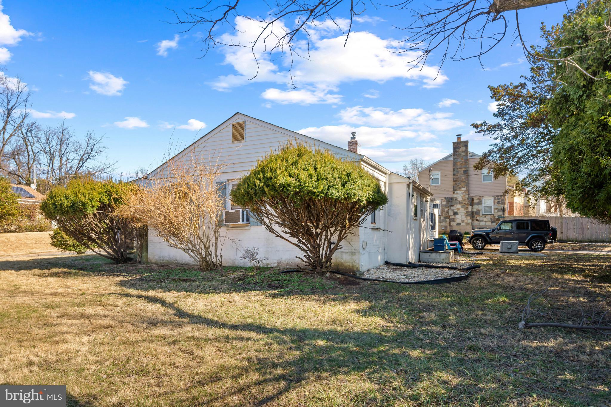 4235 Old Milford Mill Road Baltimore, MD 21208 - Photo 28 of 29 a front view of a house with a yard