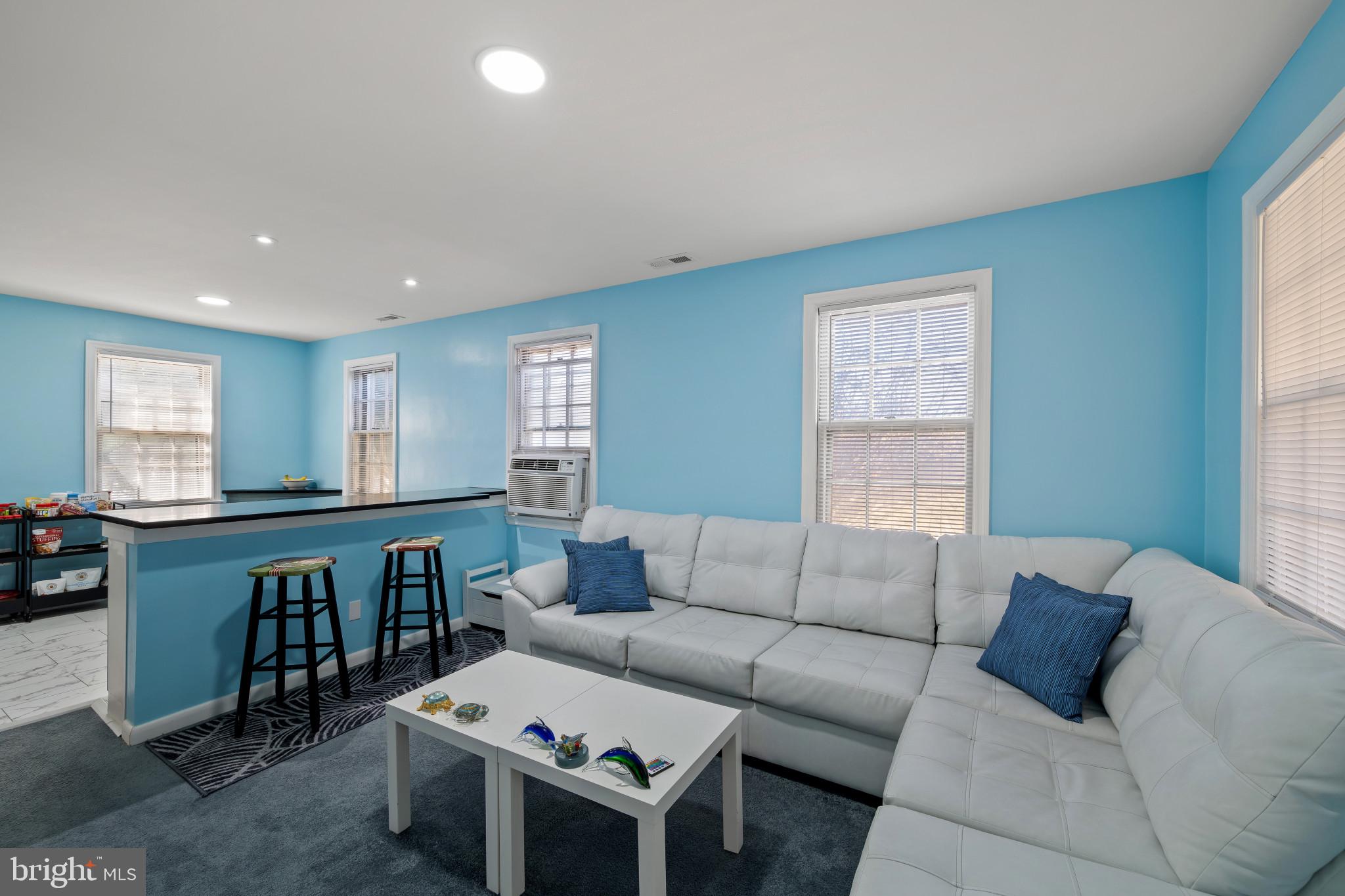 4235 Old Milford Mill Road Baltimore, MD 21208 - Photo 6 of 29 a living room with furniture and windows