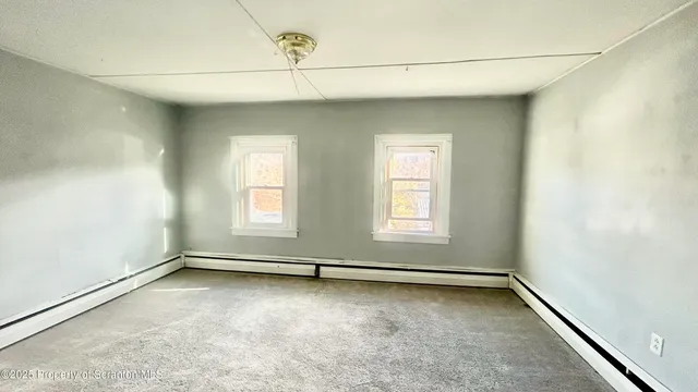 a bathroom with a sink a toilet and bathtub