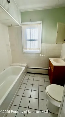 a view of entryway with a front door