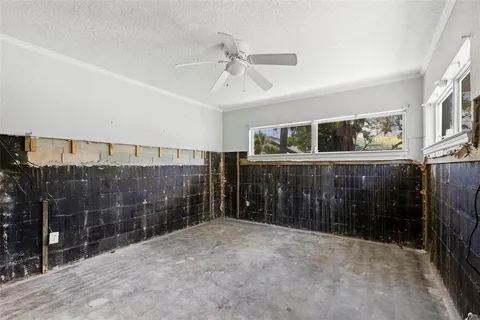 a view of a bathroom with a sink and mirror