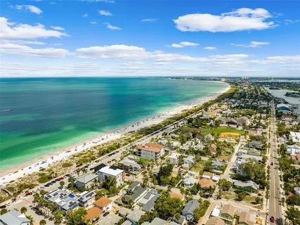 a view of an ocean and a yard